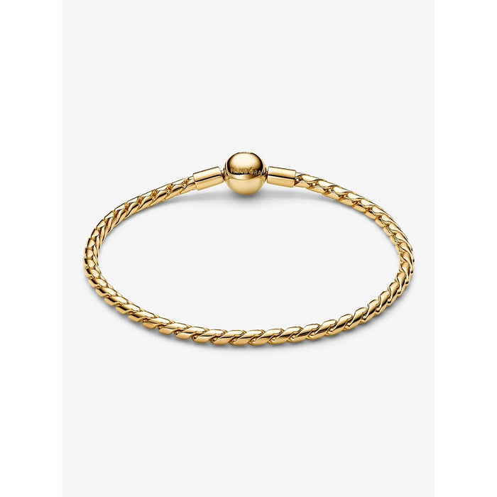 Pandora gold bracelet with spherical clasp and classic woven chain design.