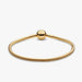 Elegant gold-plated bracelet adorned with a small ball detail.