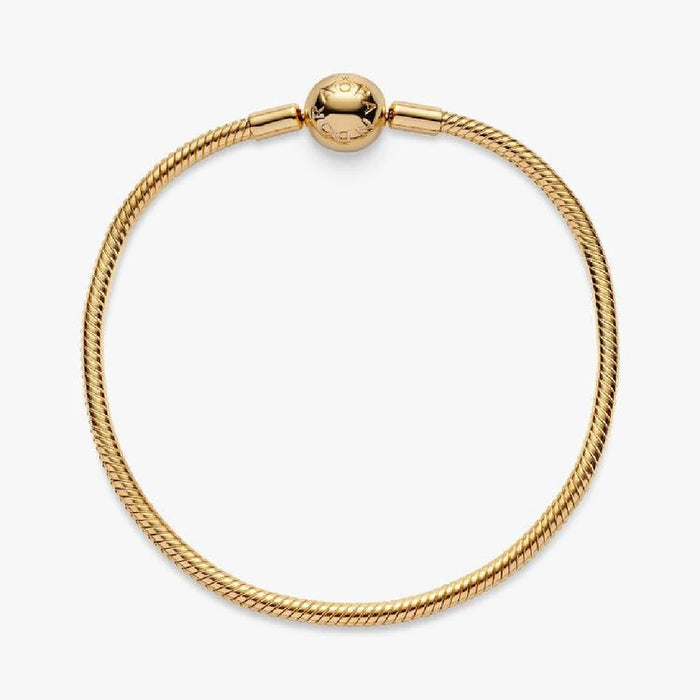 A stylish gold-plated bracelet with a tiny ball embellishment.