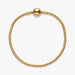 A stylish gold-plated bracelet with a tiny ball embellishment.