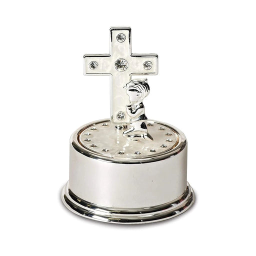 A silver cross and a small figurine displayed on an elegant silver platter.