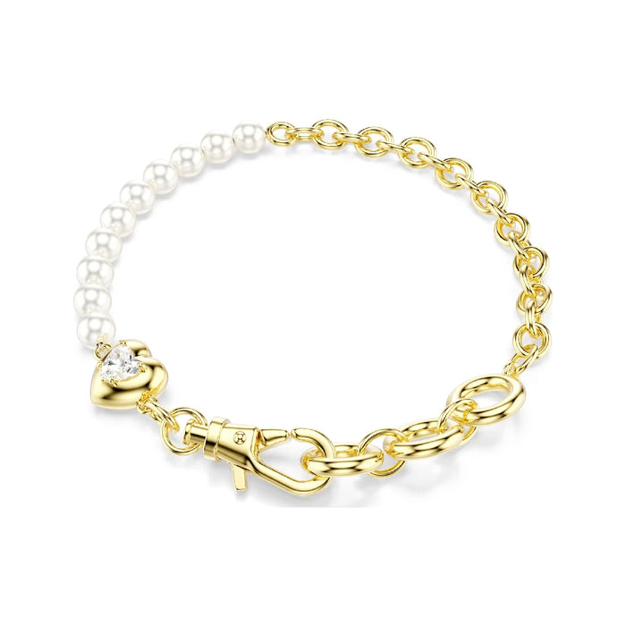 Elegant gold-plated bracelet adorned with white pearls and a charming heart pendant, perfect for any occasion.