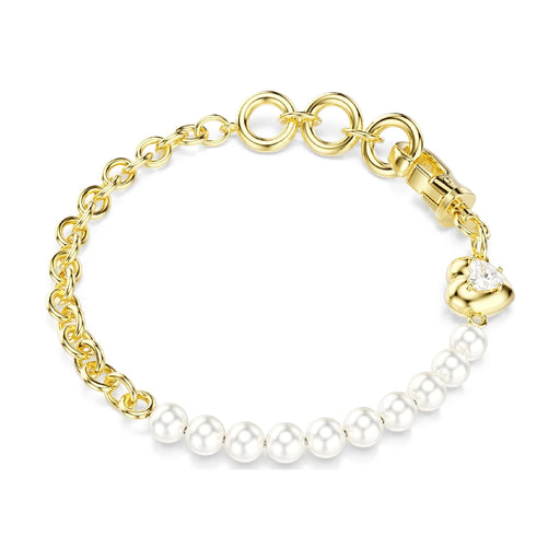 Gold-plated bracelet featuring white pearls and a heart charm, elegantly designed for a sophisticated look.