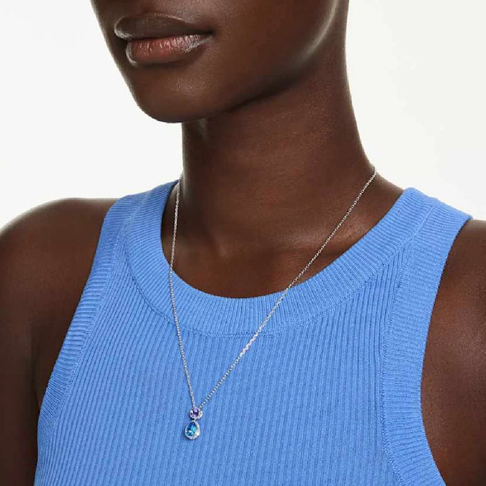 A beautifully crafted pendant with a tear-shaped stone, blending blue and purple colors harmoniously.
