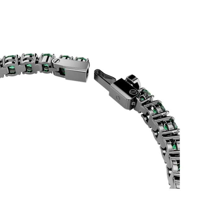 A stunning tennis bracelet embellished with rich green emerald stones, highlighting sophistication and style.