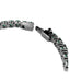 A stunning tennis bracelet embellished with rich green emerald stones, highlighting sophistication and style.