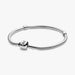 Sterling silver snake chain bracelet with a polished square clasp compatible with charm beads and designed for everyday wear.