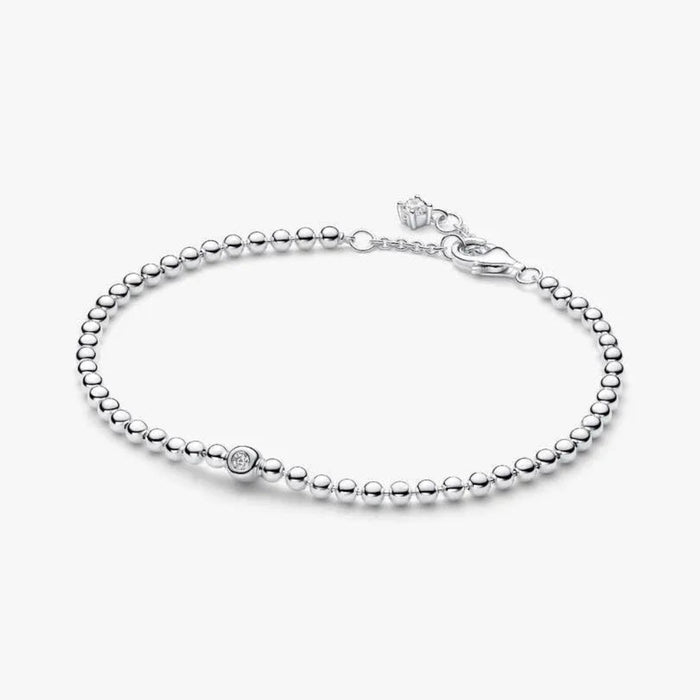 PANDORA Beads & Sparkling Stone Bracelet in sterling silver with polished beads and a bezel-set sparkling stone