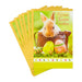 Stack of Easter cards with a rabbit and eggs design on a white background
