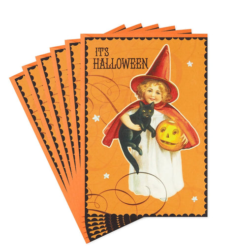 Hallmark vintage Halloween greeting card featuring a charming young witch, black cat, glowing pumpkin, and sparkling foil accents.