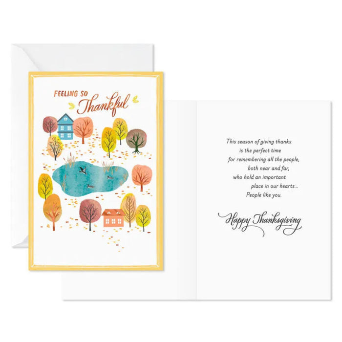 Thanksgiving card with colorful trees and houses illustration on a white background