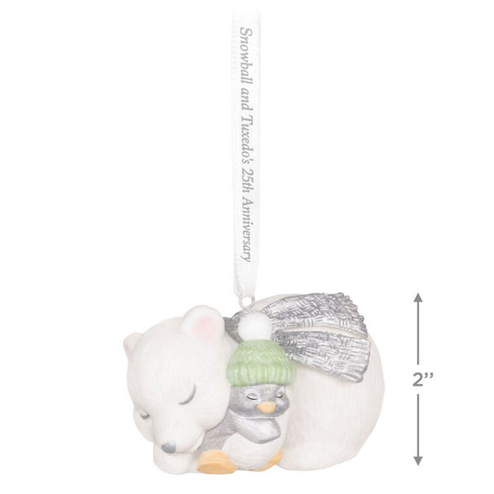 Decorative Holiday ornament with a polar bear and penguin snuggling on a white background with product dimensions 