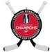 A Carolina Hurricanes Stanley Cup Champions hanging ornament shaped like hockey sticks crossed behind a circular red, black, and white center emblem featuring the Stanley Cup trophy and NHL branding.