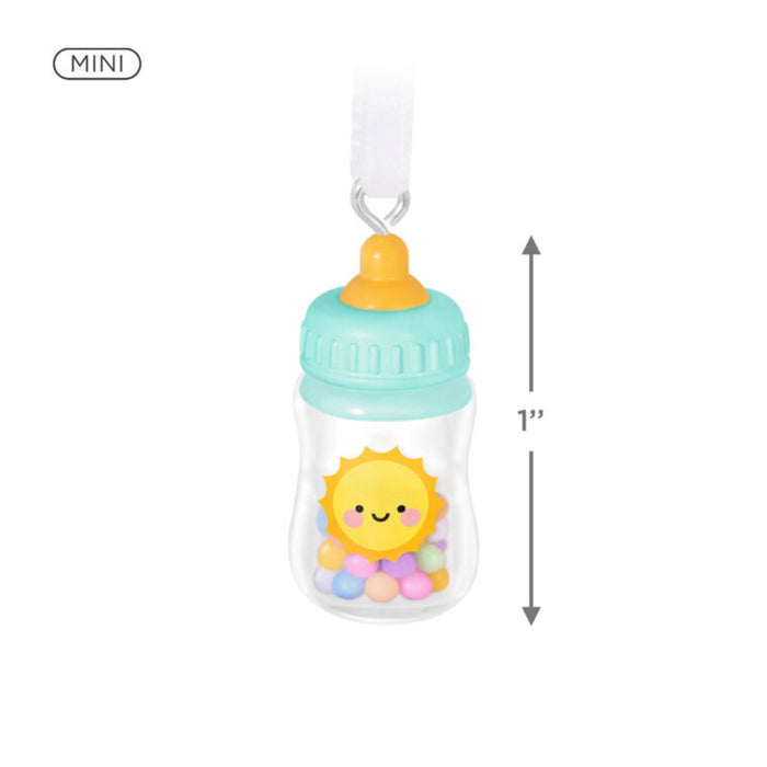 Decorative baby bottle ornament with a sun design on a white background  with product dimensions