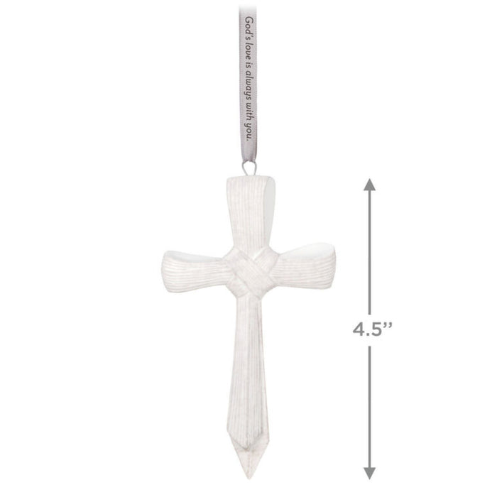 White cross ornament with text on a white background with product dimensions 