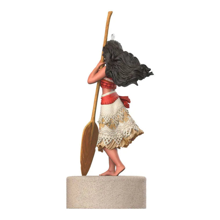 Rear view of Moana Christmas ornament highlighting flowing hair and layered skirt construction