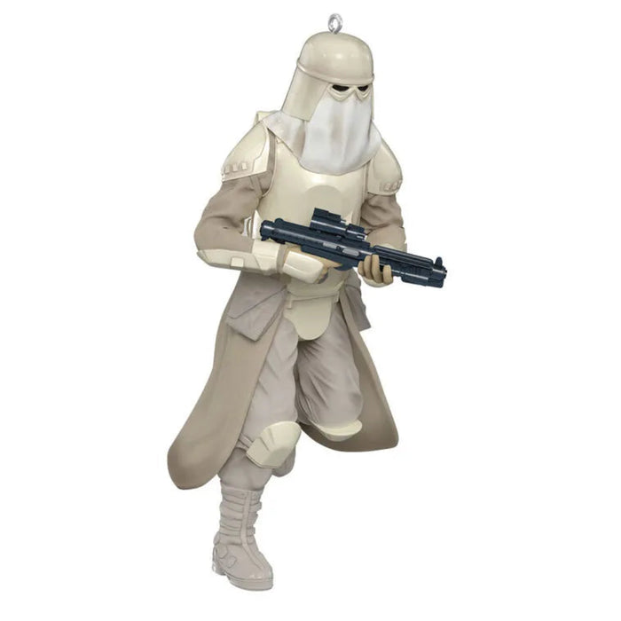 Character in desert gear holding a weapon on a white background