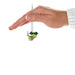 Hand holding a mini green sea turtle ornament  with a flower on a white background