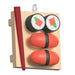 Mini Sushi Ornament with red and red rolls, and black seaweed roll on a wooden board with red chopsticks.