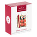 Hallmark Sweet Lil' Sushi Christmas ornament packaging on a white background