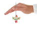 Mini Christmas ornament shaped like a Pokémon cartoon owl with a red hat and green bow tie, being held by a hand . 