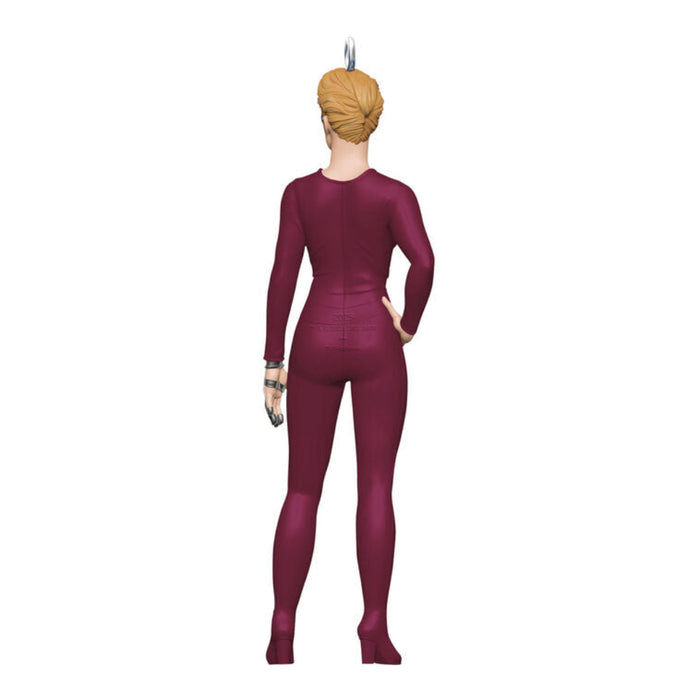 Backside of the Mini Star Trek Voyager Seven of Nine ornament in  maroon outfit, standing pose with Borg implants on a white background.