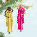 Mini Hallmark Keepsake Barbie  ornaments with two dolls, one with a pink dress and one with a yellow dress hanging on a Christmas Tree.
