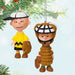 Two  Mini ornaments of the Peanuts Gang, Charlie Brown as a baseball player and a Linus as the  catcher  hanging on the Christmas tree.