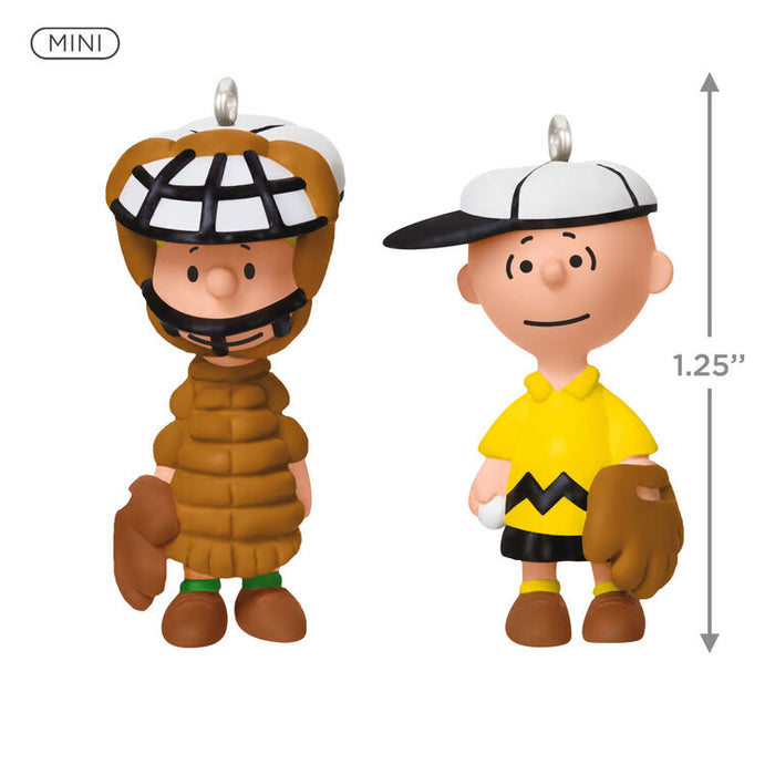 Two Mini ornaments of the Peanuts Gang, Charlie Brown as a baseball player and a Linus as the  catcher  on a white background  with dimensions of the product 