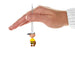 Hand holding  Mini ornaments of the Peanuts Gang, Charlie Brown as a baseball player on a white background  white background