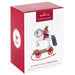 Hallmark Keepsake Christmas ornament packaging with a horse and bear figure on a white background
