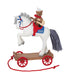Christmas ornament of  a horse on a  cart, featuring a bear rider playing a guitar on a white background. 