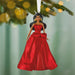 Front View: 2026 Hallmark Keepsake Latina Holiday Barbie Christmas Ornament wearing an elegant festive gown hanging on a festive tree  