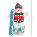 2025 Hallmark snowman ornament with goggles, hat, and sweater vest with a  snow board on white background and product dimensions ; part of the Snowtop Lodge series.