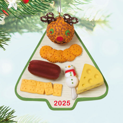 Christmas Tree shaped charcuterie board "2025" Ornament hanging from a tree