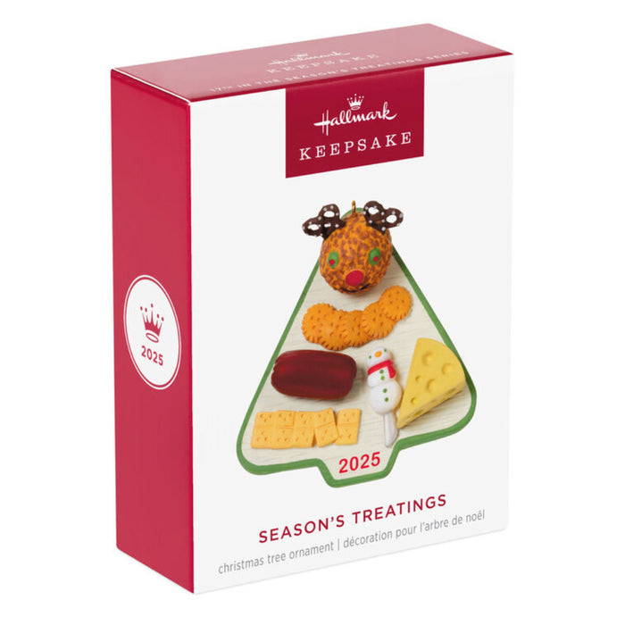 Hallmark Keepsake ornament packaging with Christmas-themed cookies on a white background