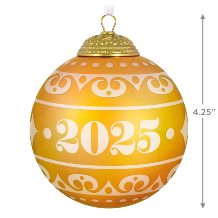 Decorative warm yellow Christmas glass ball ornament with year '2025', on a white background with product dimensions. 