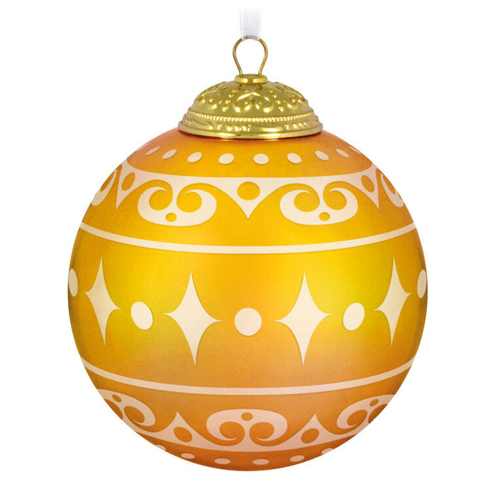 Backside of the Decorative warm yellow Christmas glass ball ornament with year '2025', on a white background