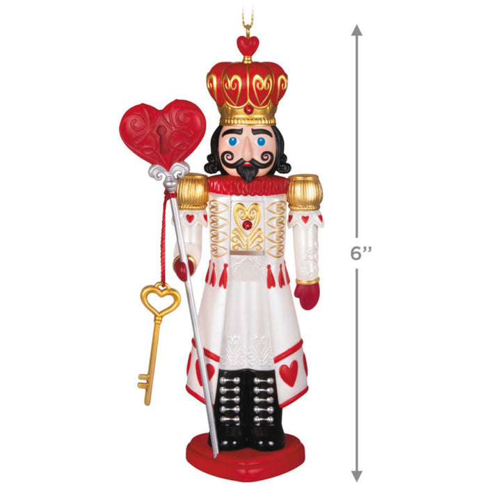 Decorative ornament nutcracker figure with a crown, heart-shaped key, and heart scepter on  a white background with product dimensions.