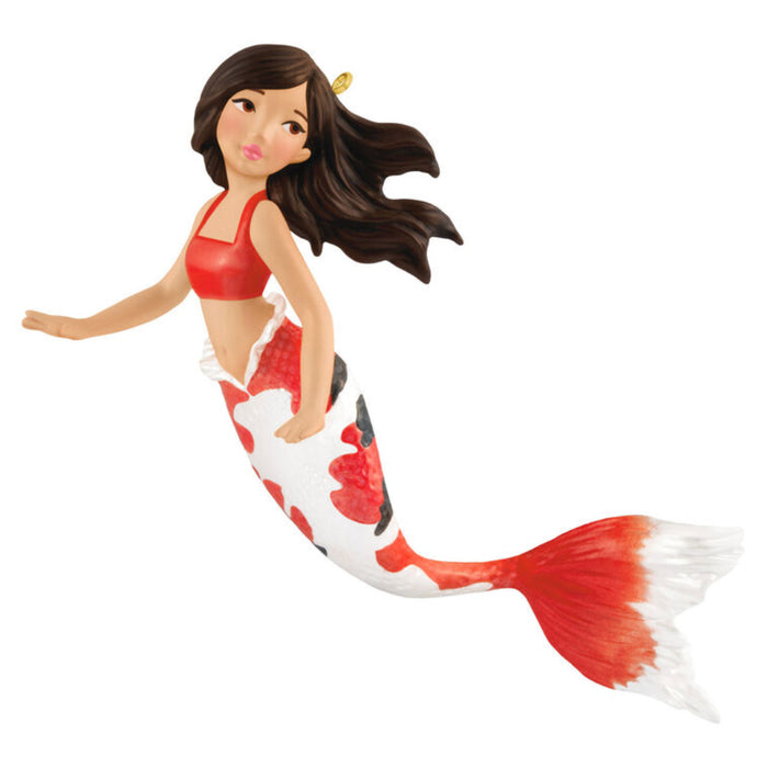 Mermaid Ornament with a red and white tail on a white background
