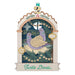 Decorative Christmas ornament with a turtle dove and musical notes on a white background 