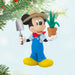 Mickey Mouse in a gardener outfit holding a potted plant and a shovel Ornament hanging on a tree 