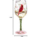 Wine glass with a red cardinal design  with product measurements on a white background