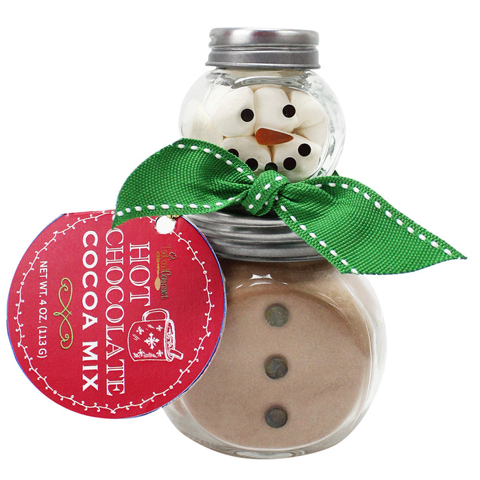 Hot chocolate cocoa mix in a jar with a snowman decoration and green ribbon on a white background