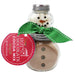 Hot chocolate cocoa mix in a jar with a snowman decoration and green ribbon on a white background