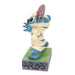 Mummy Stitch figurine featuring Disney's Stitch dressed in a playful mummy costume for Halloween décor.
