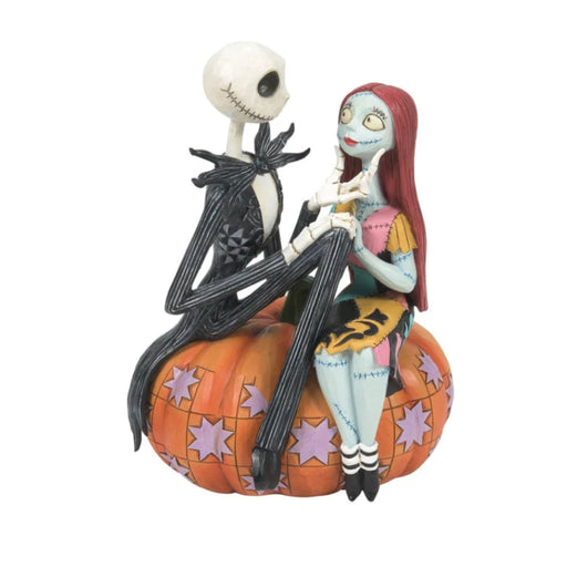 Jack and Sally figurine featuring Jack Skellington and Sally sitting together on a festive pumpkin.
