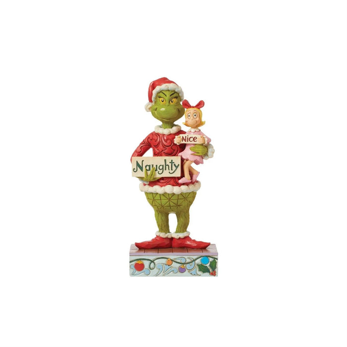 Jim Shore Figurine of Grinch in a red sweater and Santa hat holding Cindy with a sign ( naughty and nice ), on a white background.