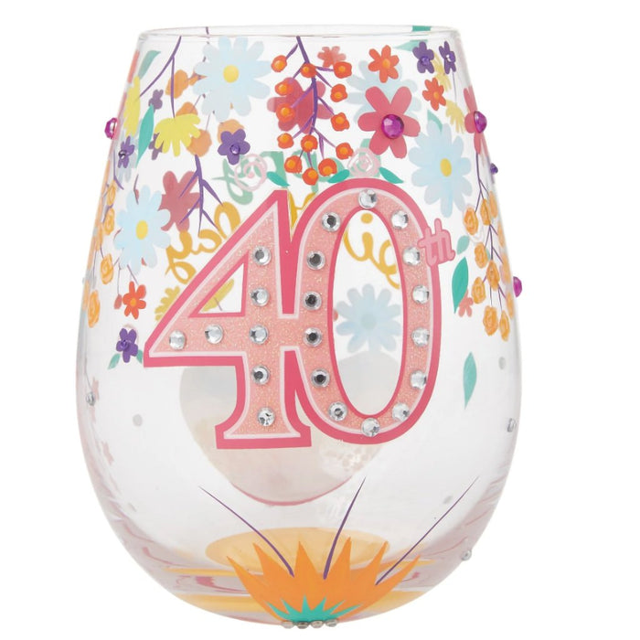 With bedazzled crystals and an array of colorful flowers, this glass is showcasing how far you've grown and experienced.