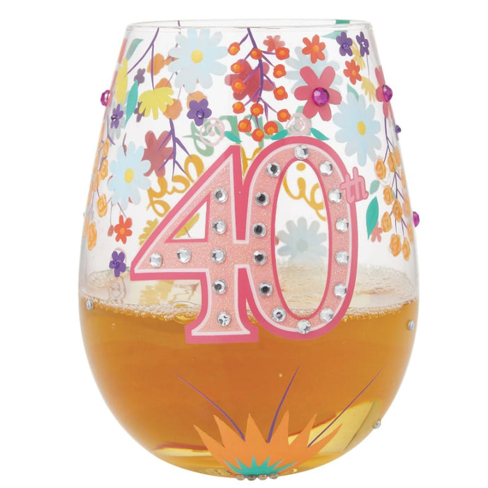 With bedazzled crystals and an array of colorful flowers, this glass is showcasing how far you've grown and experienced.